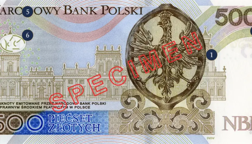 Pieniądze do druku: polski banknot 500 złotych z orłem. Widoczny napis "NARODOWY BANK POLSKI" i "PIEŚĆSET ZŁOTYCH".
